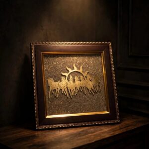 Seven golden running horses with rising sun on natural pyrite background in a wooden frame